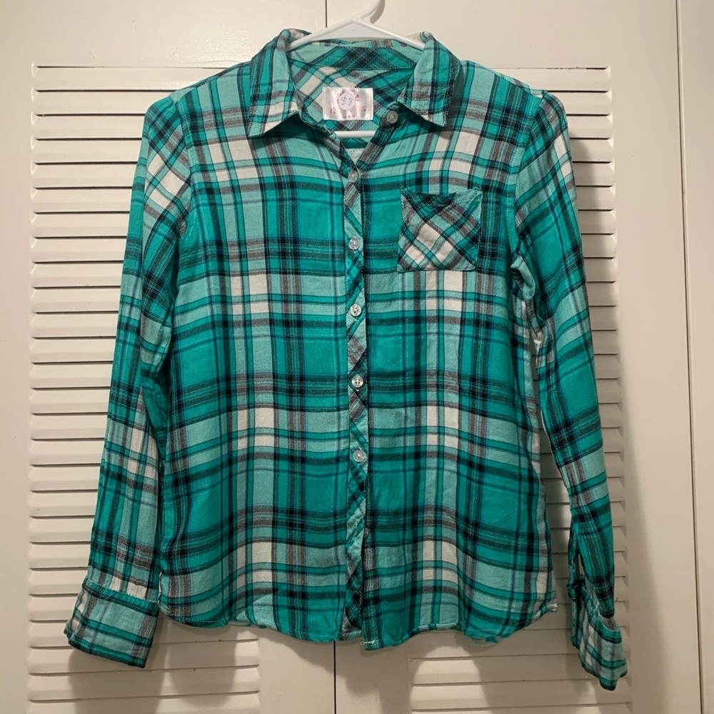 Justice blue and white top.
